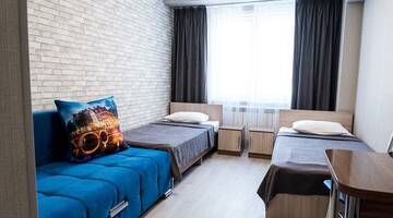 Фото номера Номер эконом с двумя кроватями, корпус Лидер Спорт без звезд Гостиница Лидер г. Старый Оскол 2