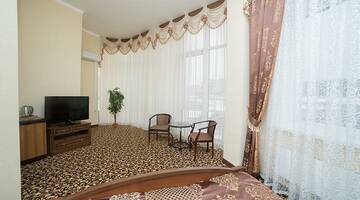 Фото номера Номер полулюкс Гостиница Лидер г. Старый Оскол 3