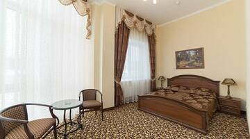 Фото номера Номер полулюкс Гостиница Лидер г. Старый Оскол 2